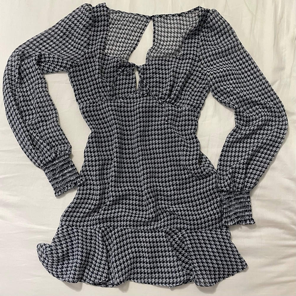 Half pleated houndstooth print mini dress with romantic sleeves and open back